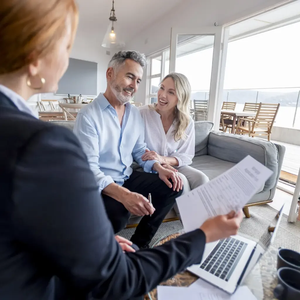 Couple working with agent showing high level of service